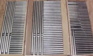 Metal rods organized in three cardboard boxes.